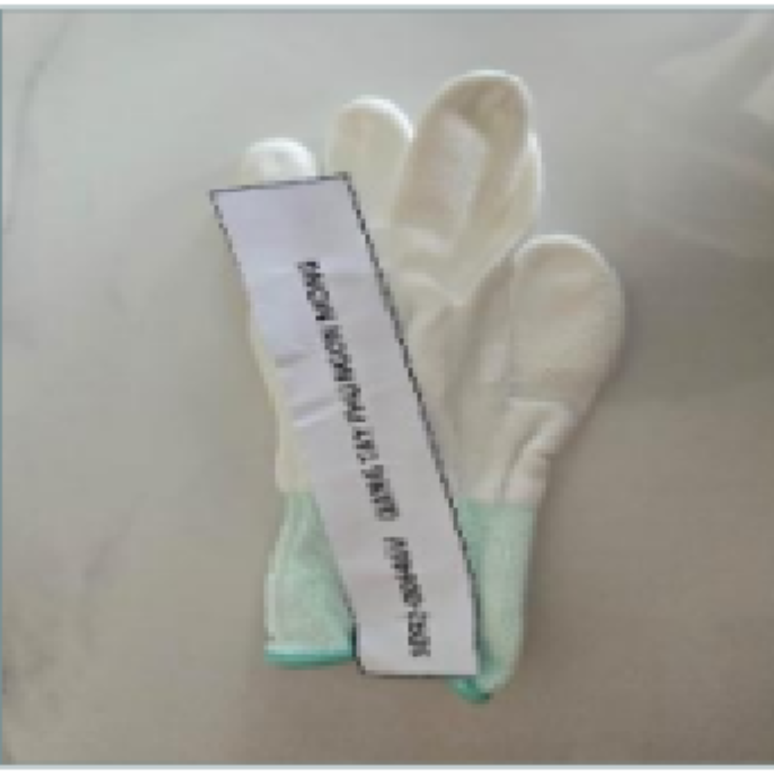 Gang tay màu trắng phủ PU ngón tay, có viền